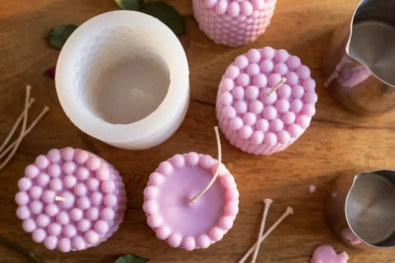 Silicon Bubble Ball Candle Mould with DIY soy wax candles on a craft table
